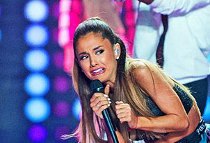Ariana Grande looking scared